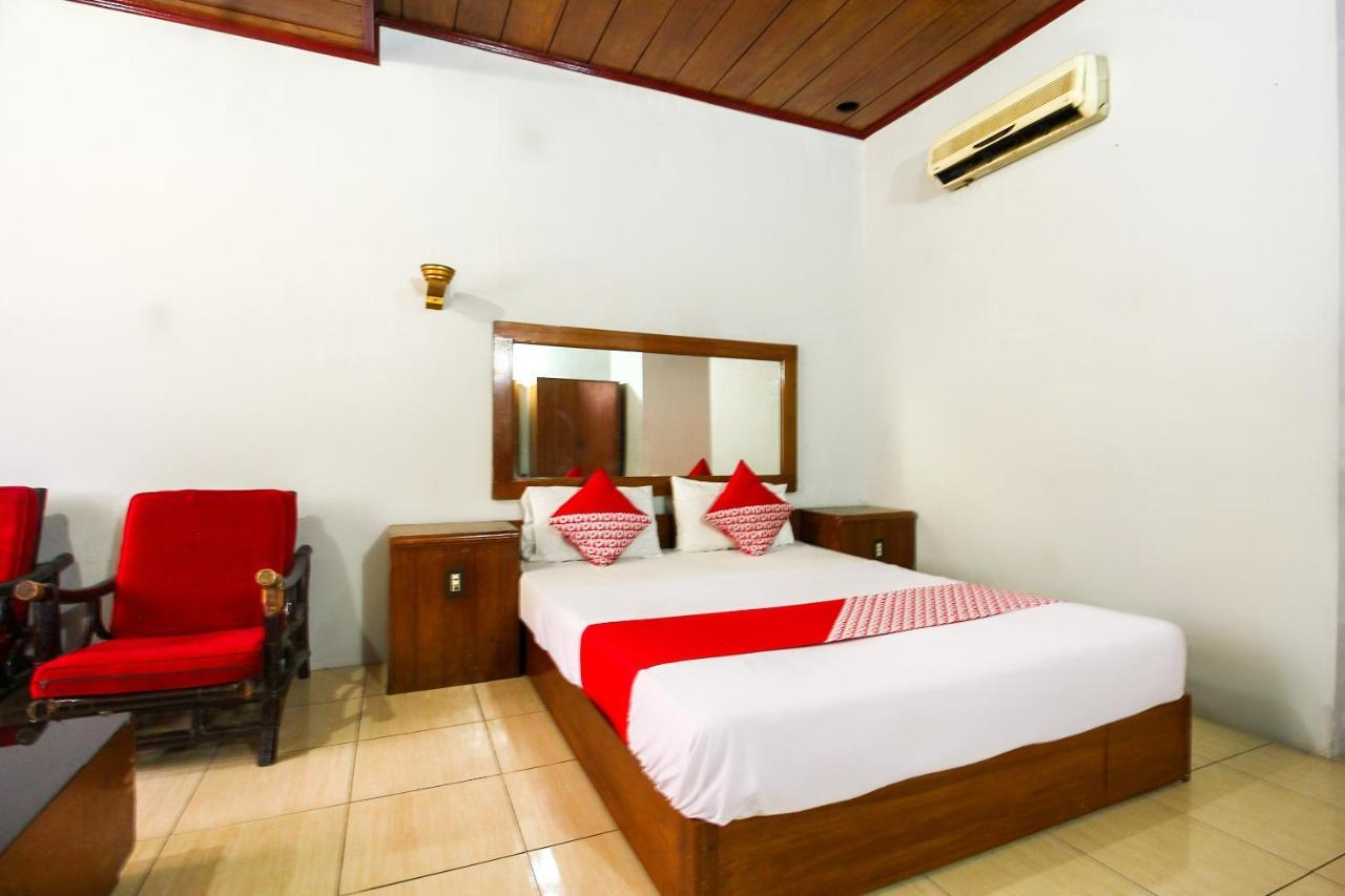 Oyo 3180 Hotel Rian Cottage Palembang Bagian luar foto