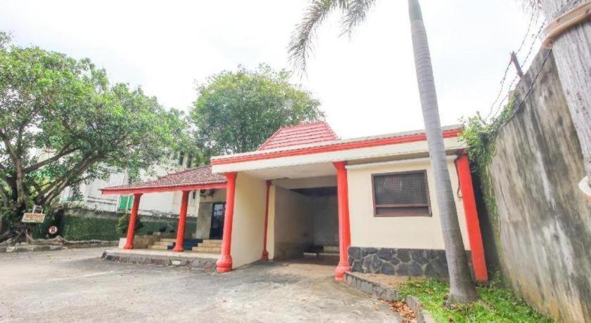 Oyo 3180 Hotel Rian Cottage Palembang Bagian luar foto