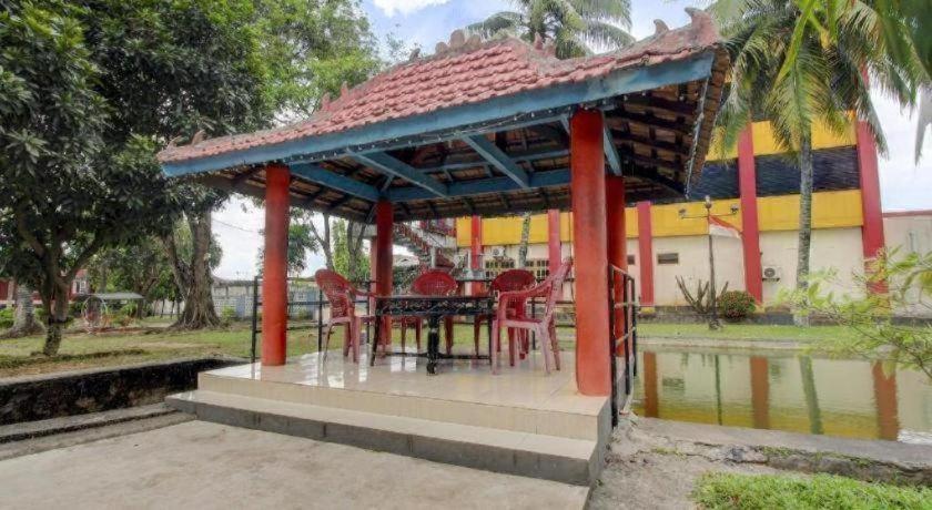 Oyo 3180 Hotel Rian Cottage Palembang Bagian luar foto